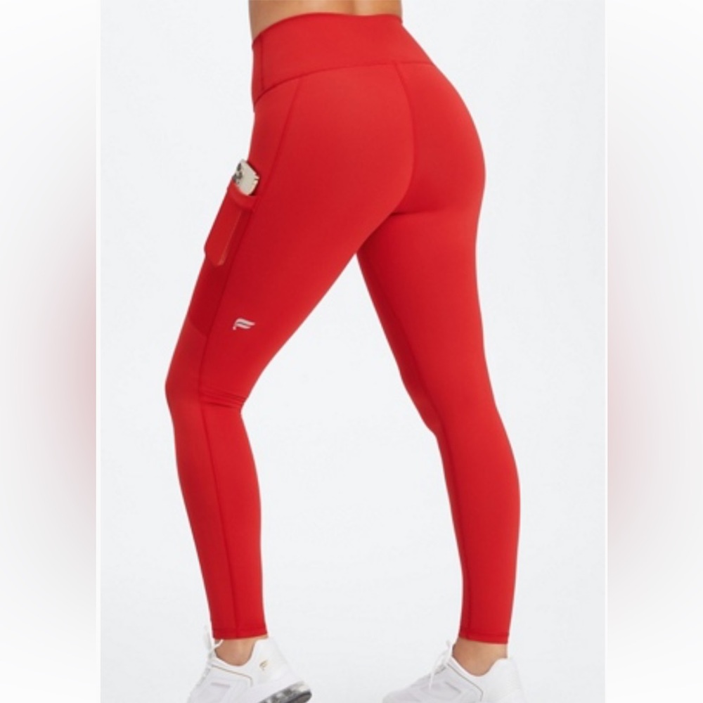FABLETICS On-The-Go PowerHold® High-Waisted
Legging in Sweet Cherry